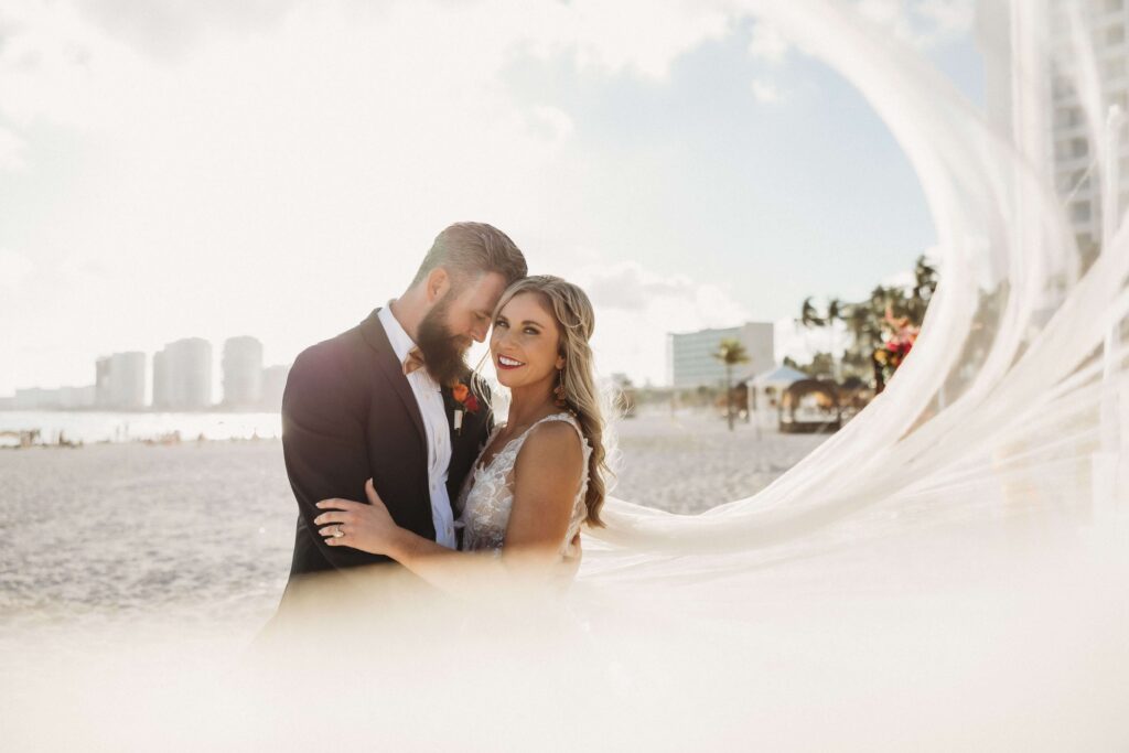 Mallory and James beach destination wedding ceremony photo Hyatt Ziva Cancun