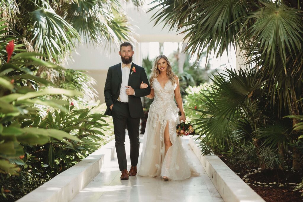 Mallory and James beach destination wedding ceremony photo Hyatt Ziva Cancun